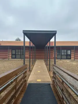 Custom-built school walkway cover
