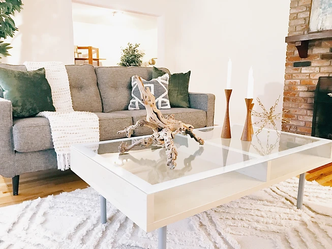 modern minimal pillows sofa table glass fireplace brick modern minimal pillows sofa table glass fireplace brick