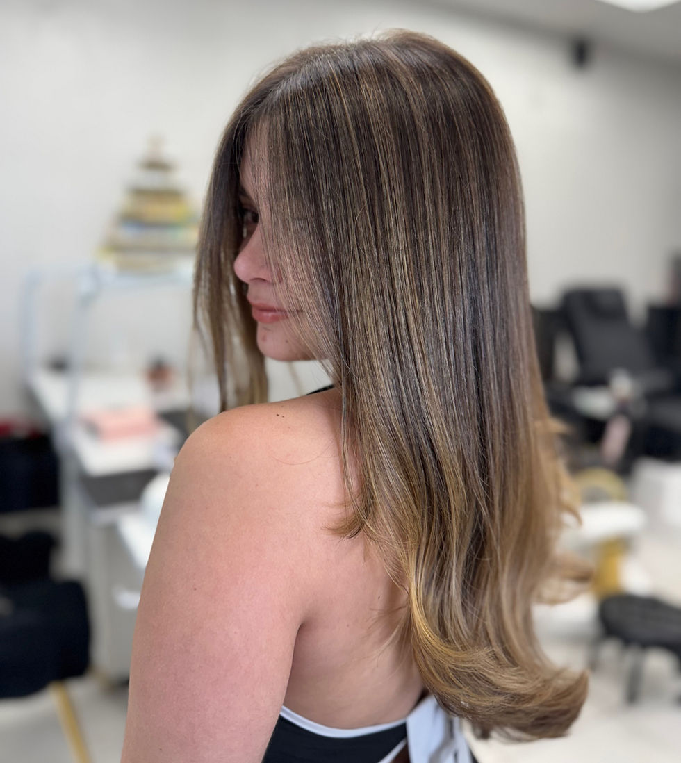 Eye-level view of a modern beauty salon interior with elegant styling chairs