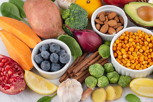 Immunity-boosting foods including chickpeas, almonds, garlic, and blueberries