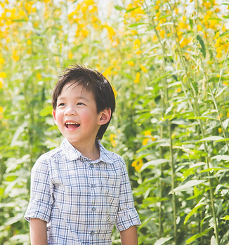 Child in field with good health