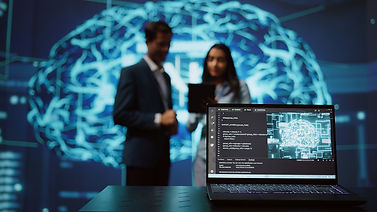 Two people use cutting edge AI technology in a state-of-the-art classroom or office.