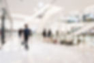 Shoppers browse a luxury shopping mall following public health guidelines