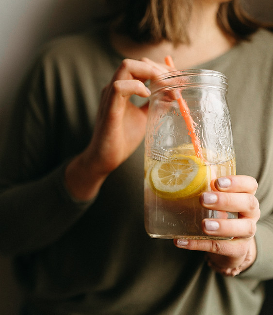 Teresa sipping lemon water.jpg