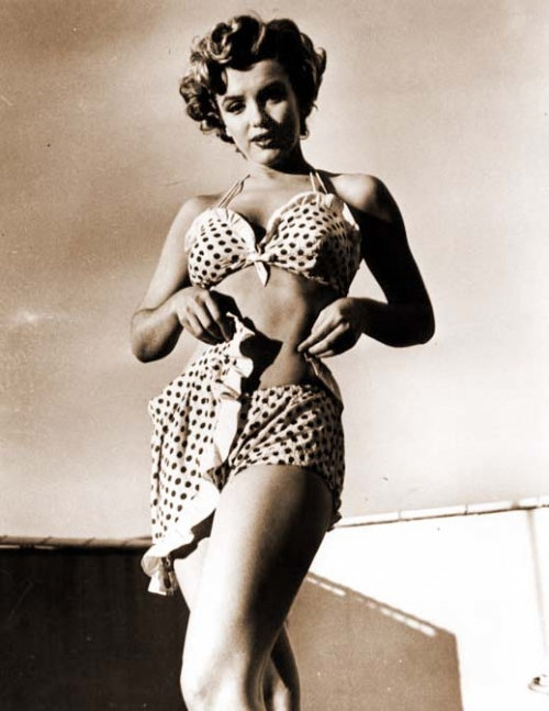  In 1951, Monroe was famously photographed wearing a polka dot bikini.
