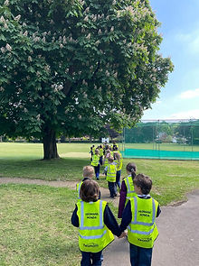 St John's School pupils crossing Churt Recreation Ground