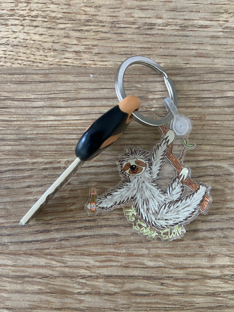 The Sober Sloth keyring