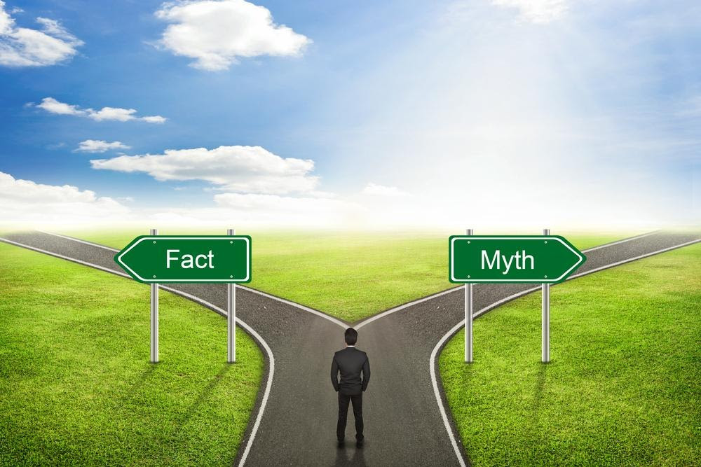 man standing at crossroads fact vs. myth