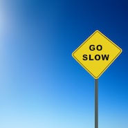 Go Slow road sign