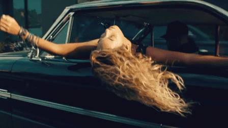 Girl laying outside car window