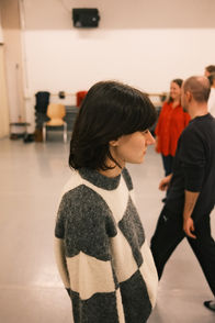 Cast member in profile at a ZEST Farragut North theatre rehearsal, June 2026.