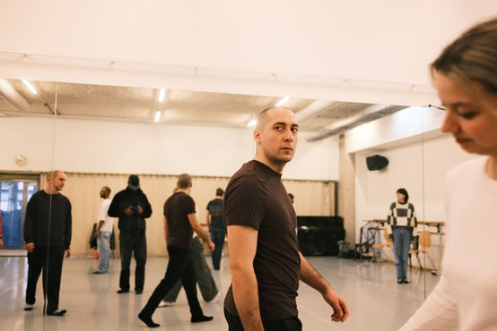Cast members in a studio rehearsal for ZEST's Farragut North theatre production, June 2026.