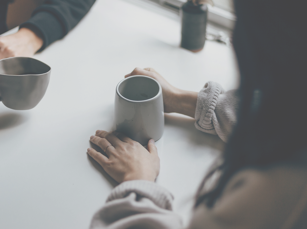 woman in black long sleeve shirt holding