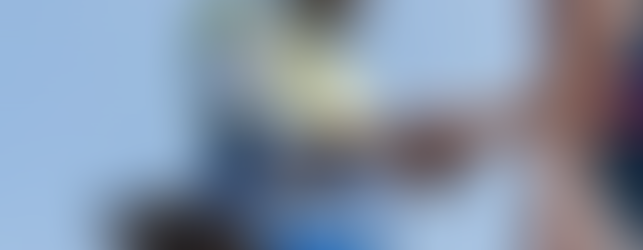 Construction worker shaking partners hand