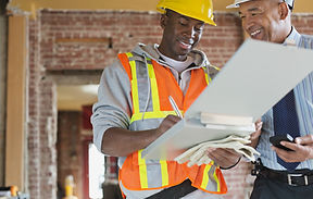 Tradesman and Architect at Construction