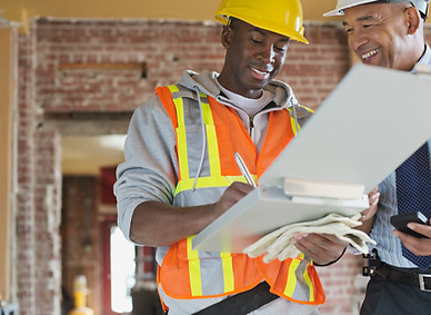 Tradesman and Architect at Construction