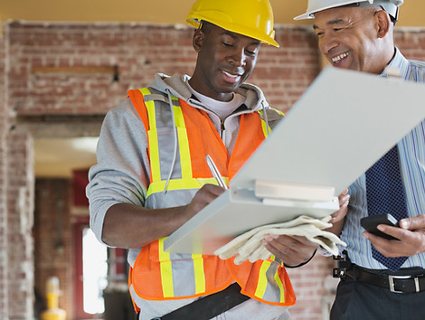 Tradesman and Architect at Construction 