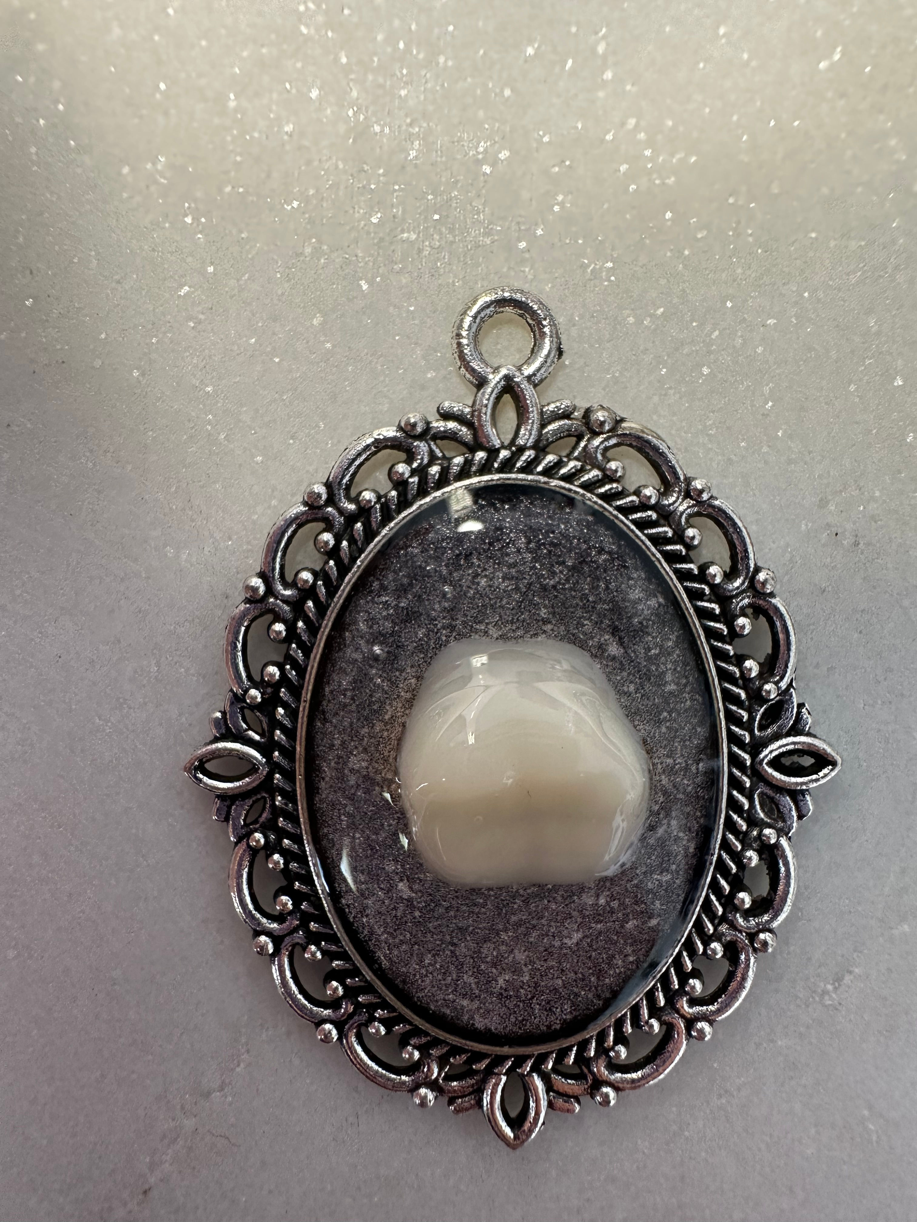 Pendentif Dent