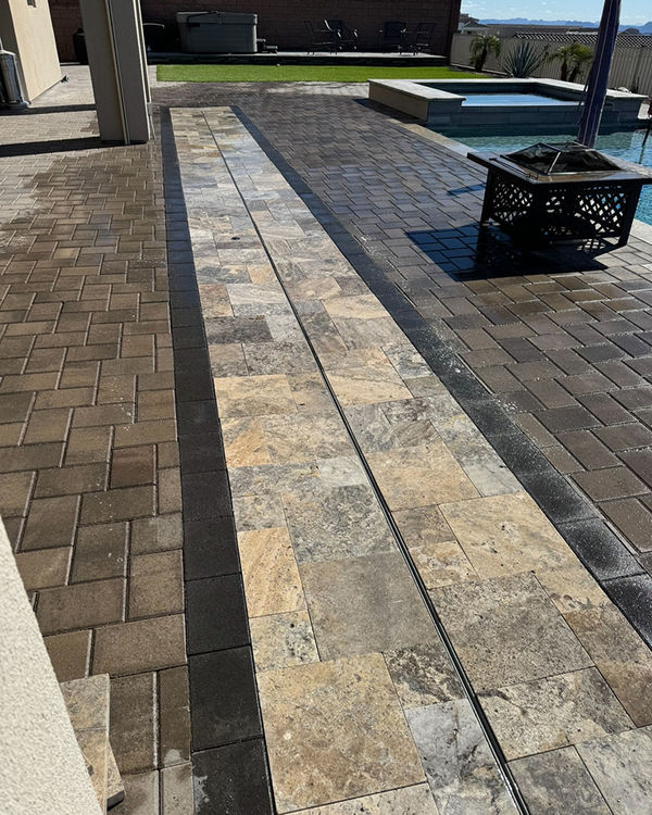 Pool deck paver project with travertine inlay
