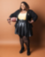 Maria holding a football