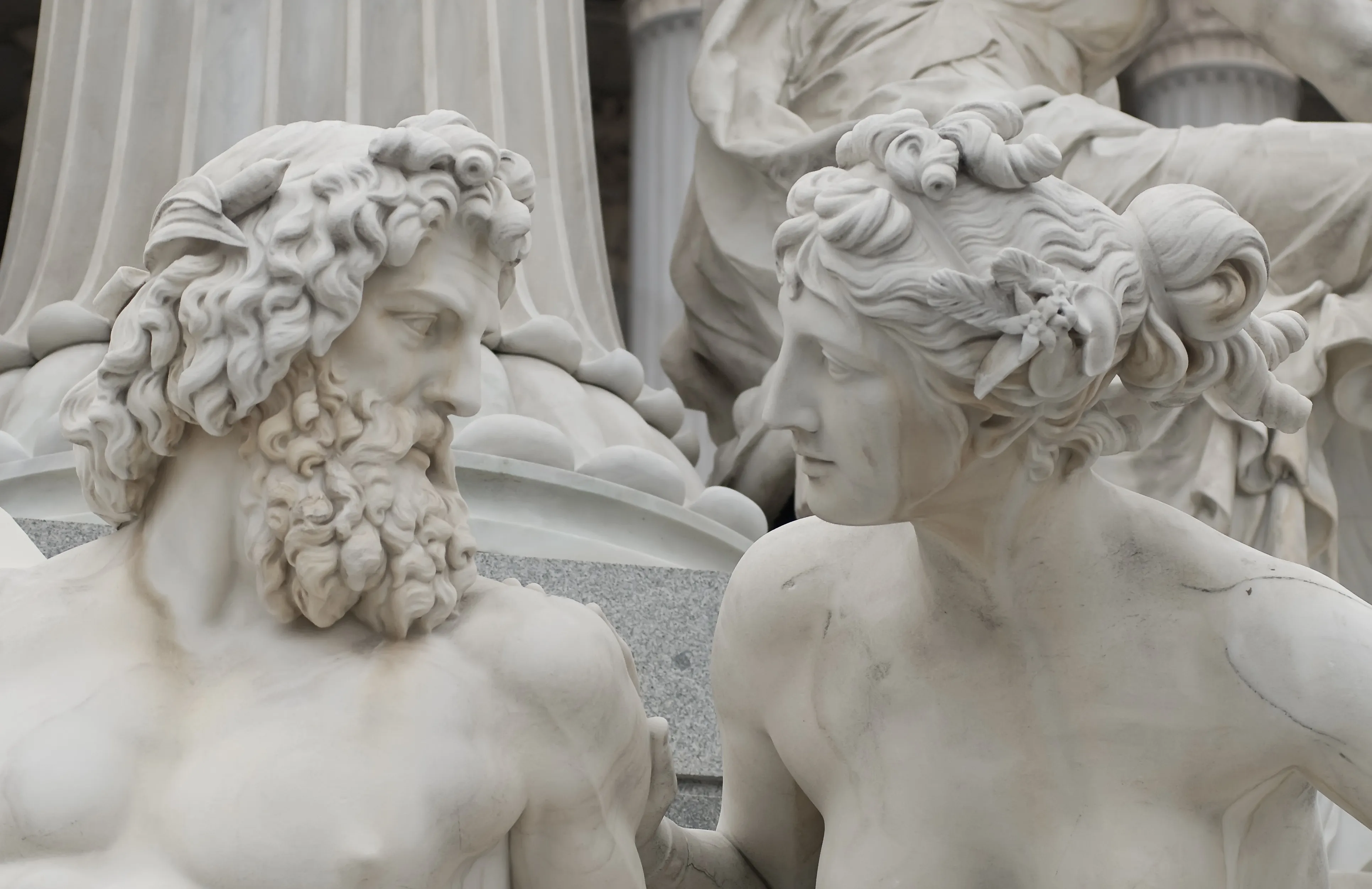 greek statue man & woman.webp