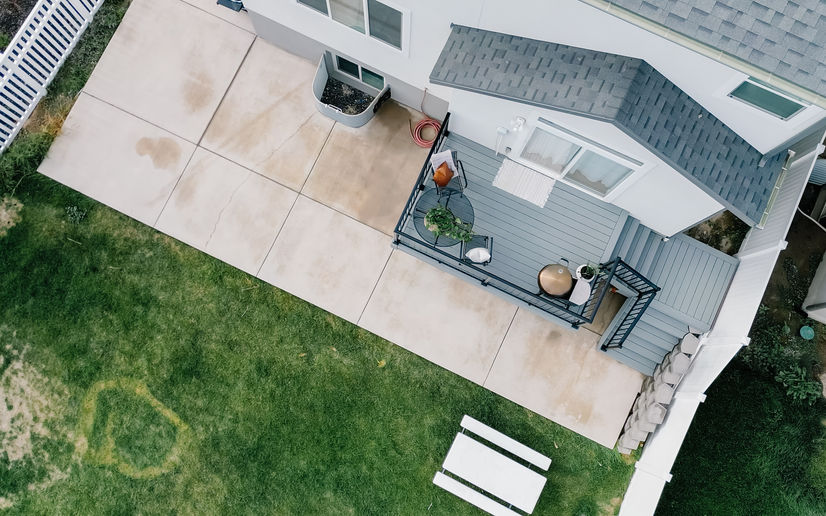 Deck, patio, lawn, and trampoline all on your desired small backyard ready for entertaining