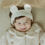 Thumbnail: The Hola Bear Baby Bib + Hairband Set is a charming and versatile duo that combines functionality with adorable style. This s