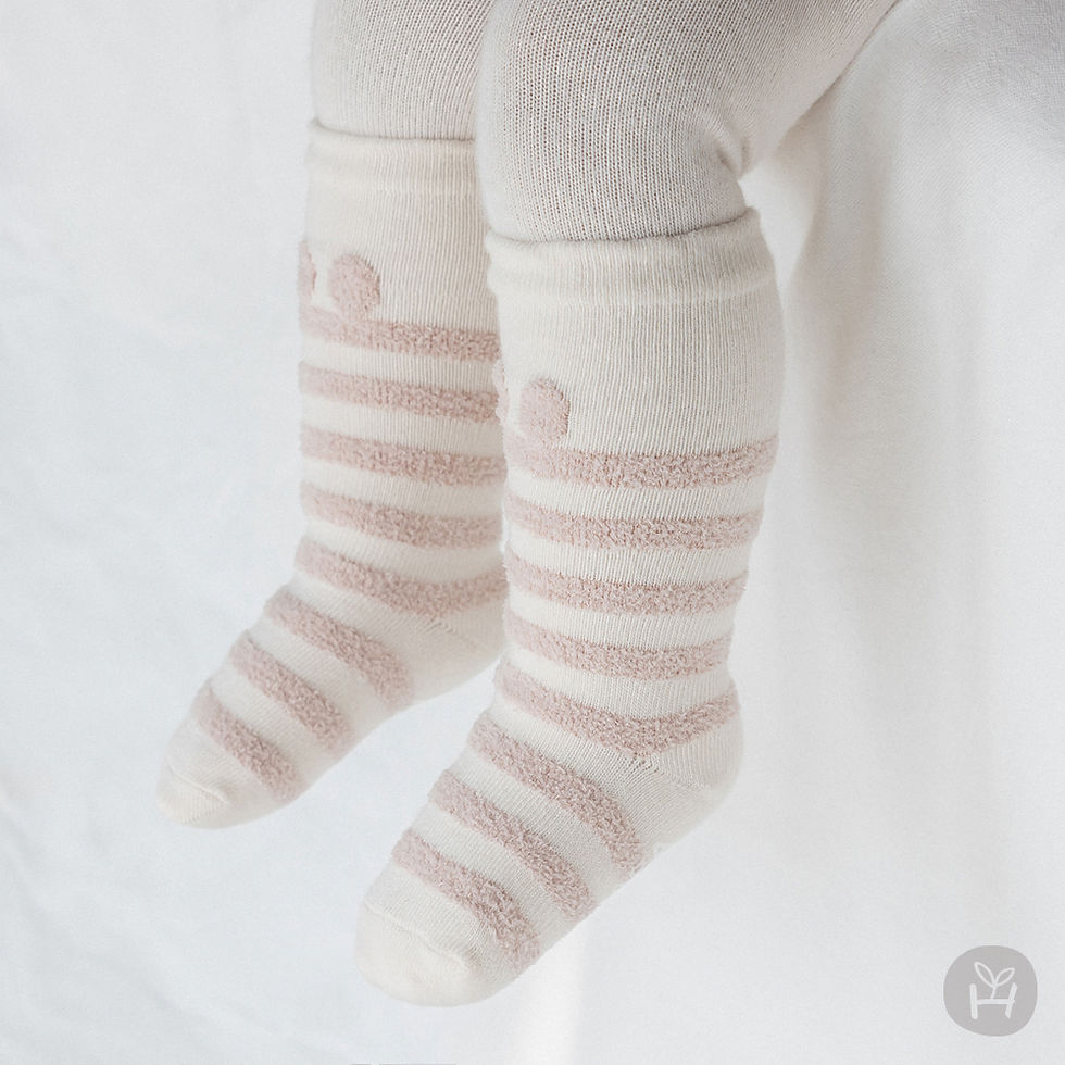 Thumbnail: The Tori Winter Baby Knee Socks Set includes soft and cozy Taktel socks, crafted with a blend of cotton and Taktel yarn
