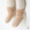 The Ruko Warmer Baby Socks feature a basic yet sophisticated design, making them versatile enough to be worn as natural warme