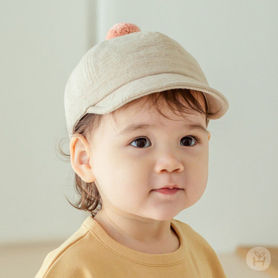 縮圖：The Jackie Baby Wire Cap features an adorable pom-pom at the center and comes in basic colors, making it easy to coordinate w