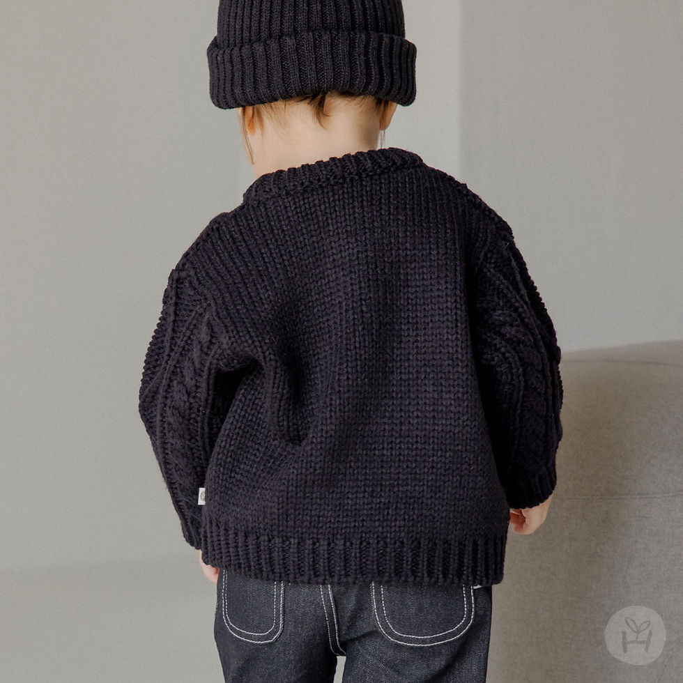 Thumbnail: The Brahms Knit Baby Sweater is designed in a modern black color, offering a cozy and warm fit for your little one. Made from