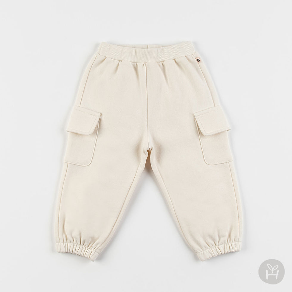 The Totu Baby Jogger Pants feature a basic ivory color and a stylish cargo pants design, complete with side pockets on both s