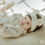 Thumbnail: The Hola Bear Baby Bib + Hairband Set is a charming and versatile duo that combines functionality with adorable style. This s