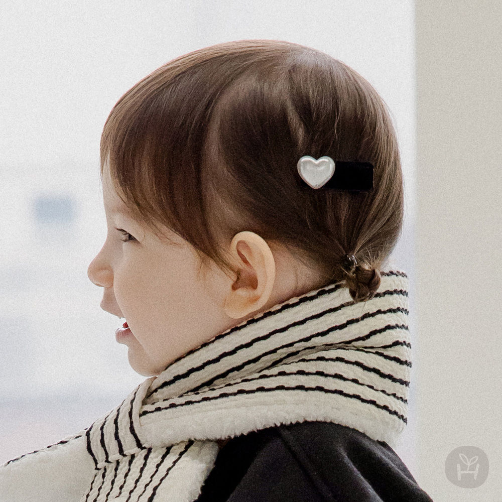 The Marie Baby Hairpin Set is perfect for special occasions or everyday wear, making it an essential addition to your baby's