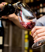 Pouring Red Wine in Glass