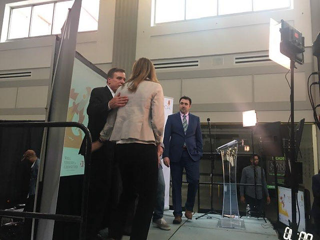 Monique Adams with Senator Warner
