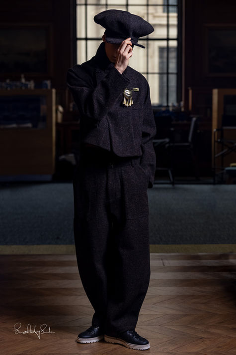 A model poses backstage at the Labrum A/W 2026 runway show