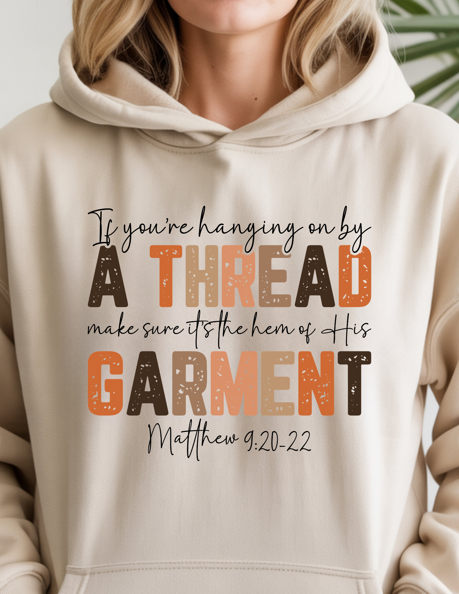 Ivory hoodie with graphic inspirational quote on front