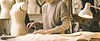 attractive-senior-woman-working-with-mannequins-colorful-fabrics-fashion-studio_edited.jpg