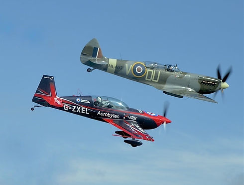 spitfire fly alongside
