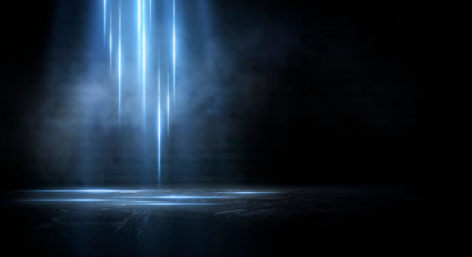 Decorative background image of blue lights streaking up and down the page.