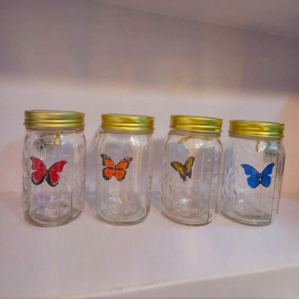 Miniature : tap activated butterfly in a glass jar