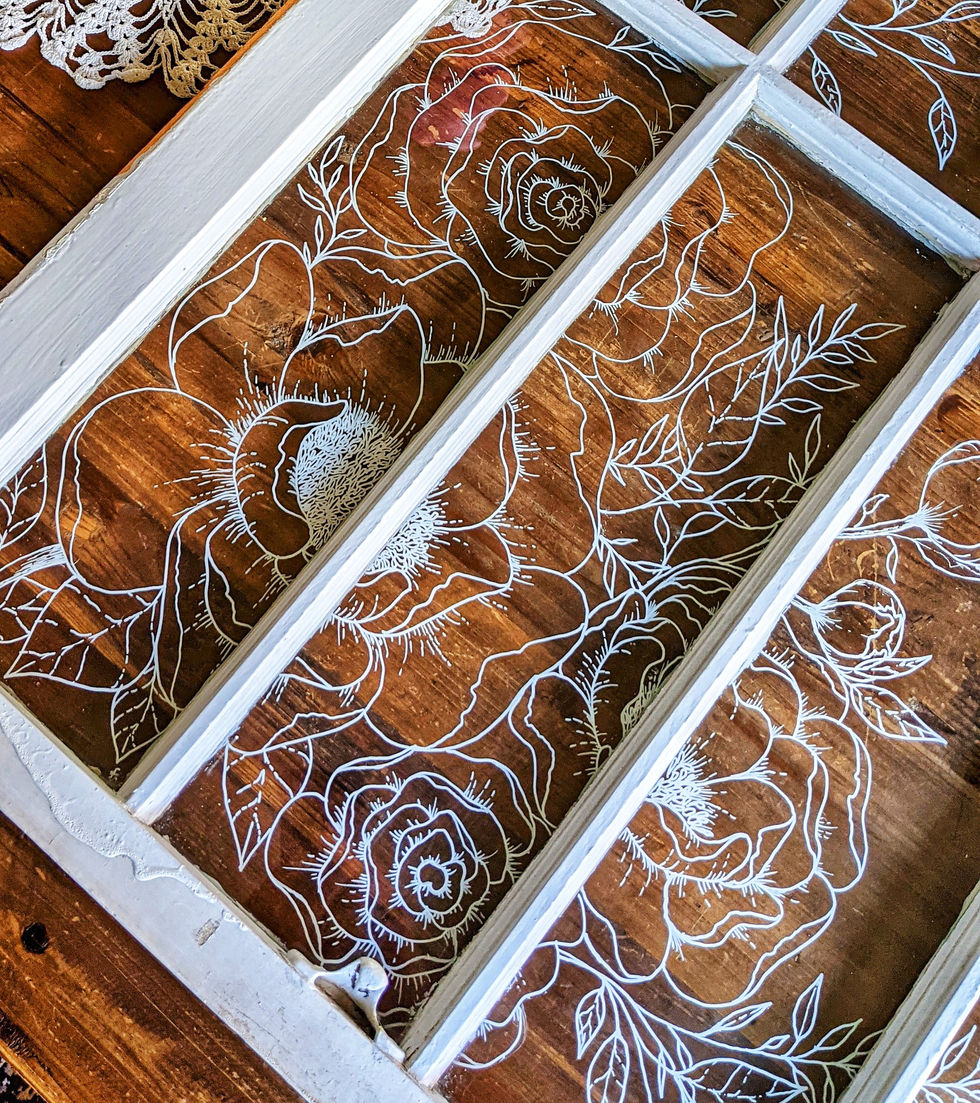 Antique window with floral illustration on glass