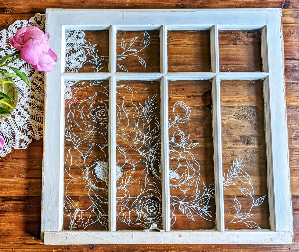 Antique window with floral illustration on glass