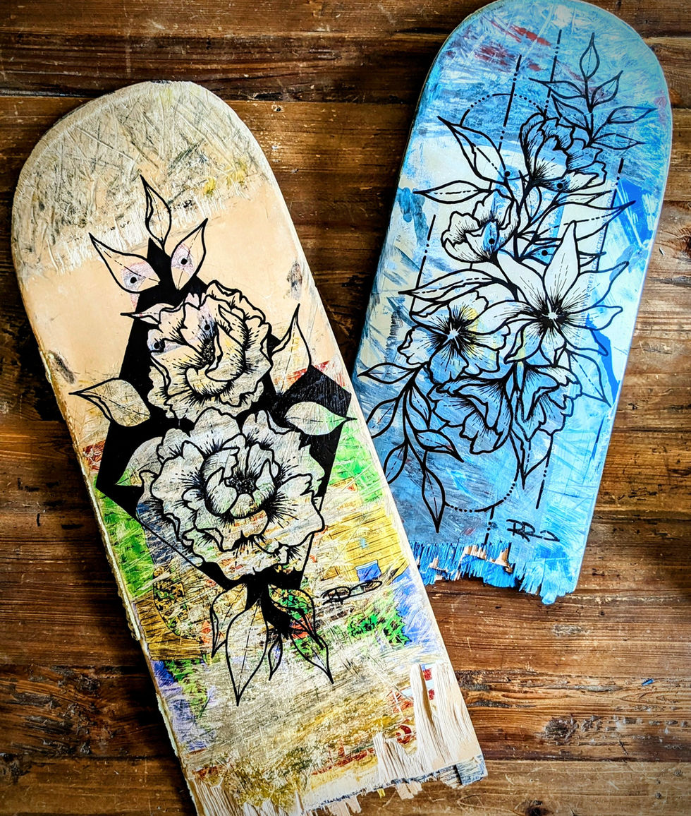 broken skateboards illustrated with floral designs