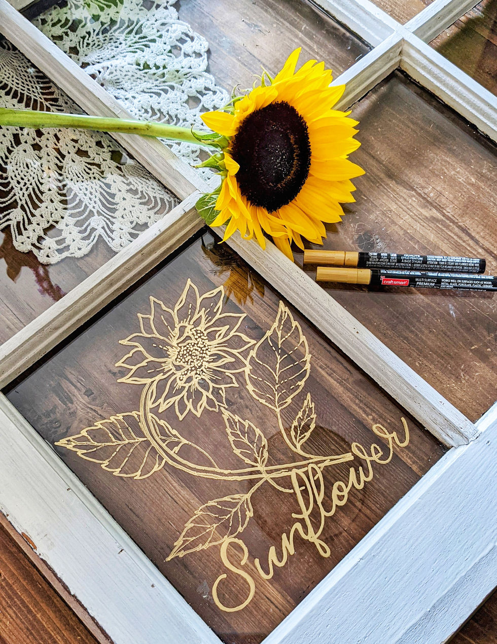 Antique window with floral illustration on glass