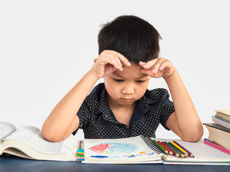 A kid cannot concentrate on homework