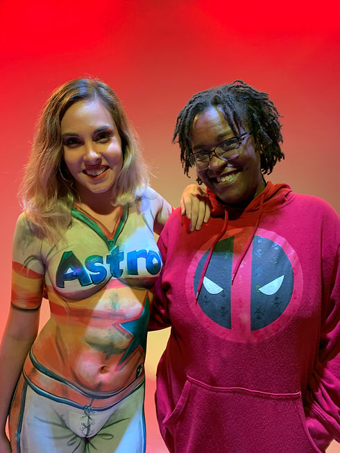 Bodypainted model Corinna painted in an Astros uniform, next to ABC BODYART owner, Vonetta Berry,