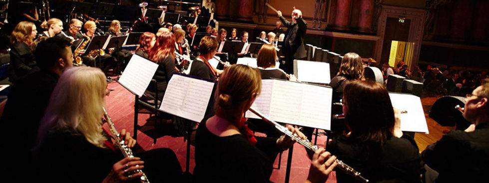 Photograph of Phoenix Concert Band performing at a corporate event at Leeds Town Hall
