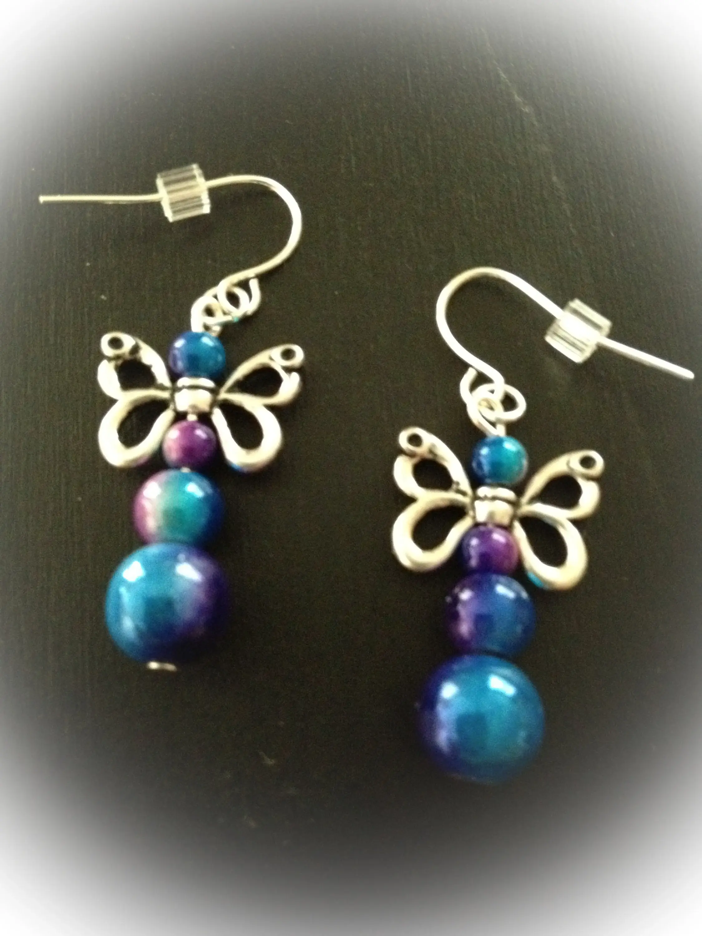 Eclectic Tastefully Artisan Snow butterflies iridescent purple and blue glass